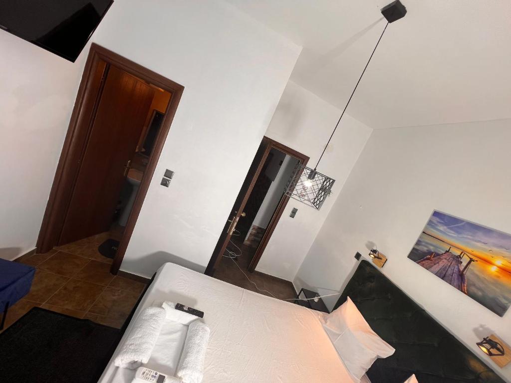 TV a/nebo společenská místnost v ubytování blue Hotel