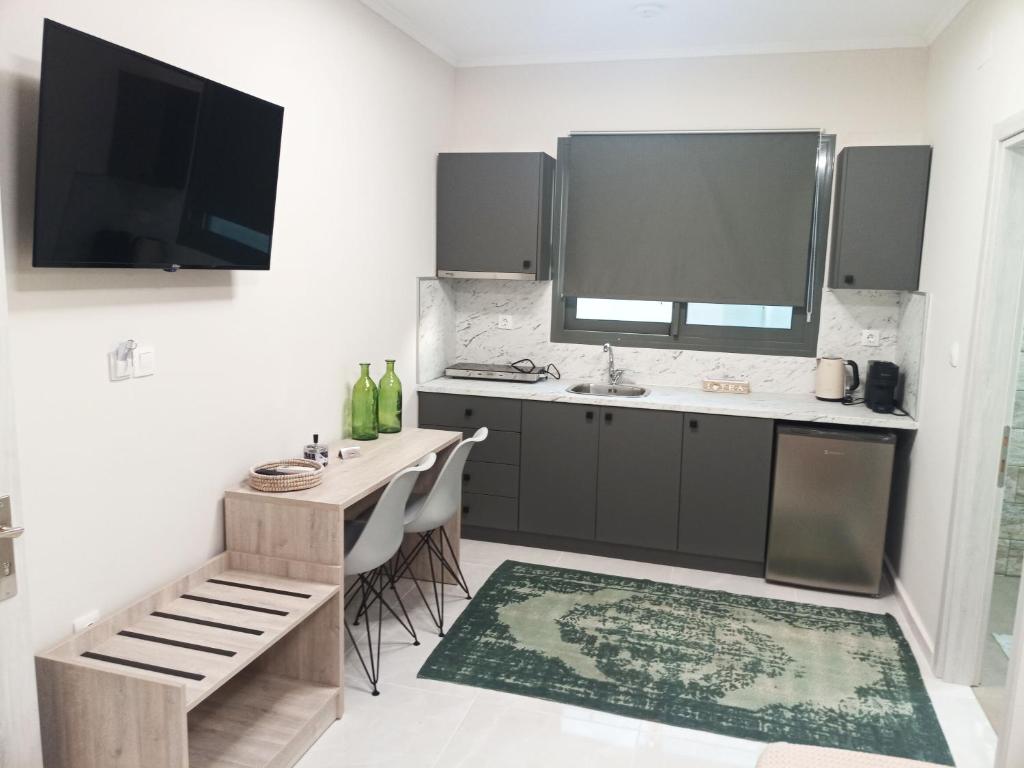 Kuchyň nebo kuchyňský kout v ubytování Zathay Apartments