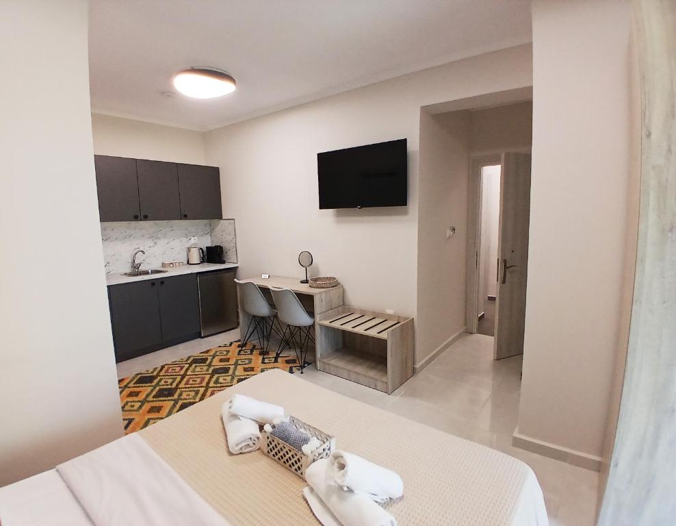 Postel nebo postele na pokoji v ubytování Zathay Apartments