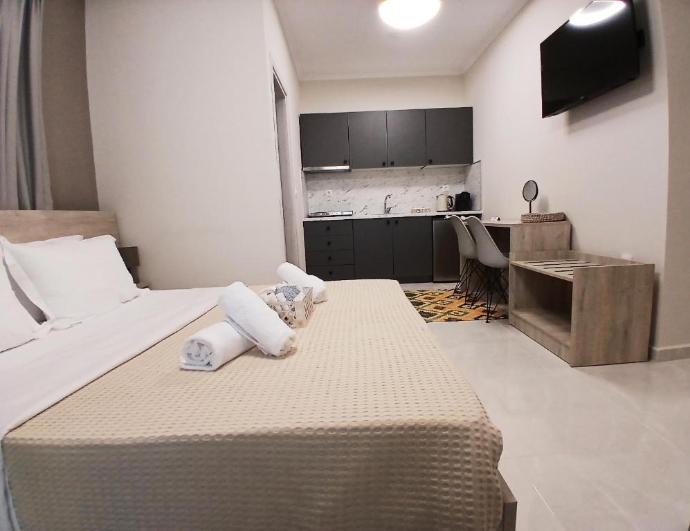 Postel nebo postele na pokoji v ubytování Zathay Apartments