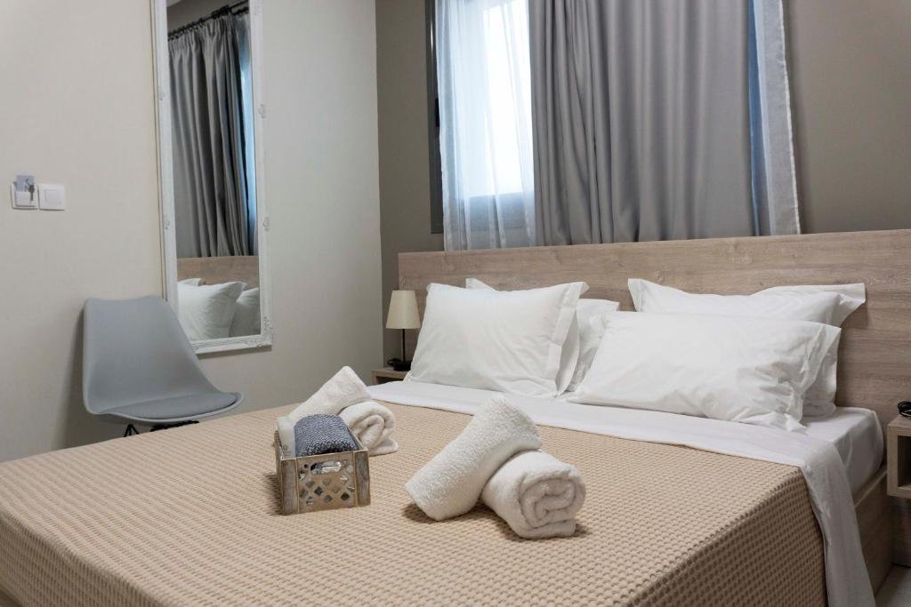 Postel nebo postele na pokoji v ubytování Zathay Apartments