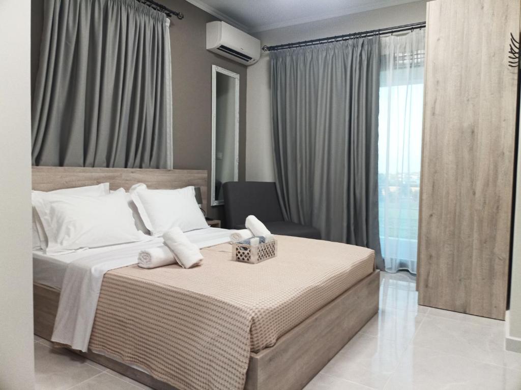 Postel nebo postele na pokoji v ubytování Zathay Apartments