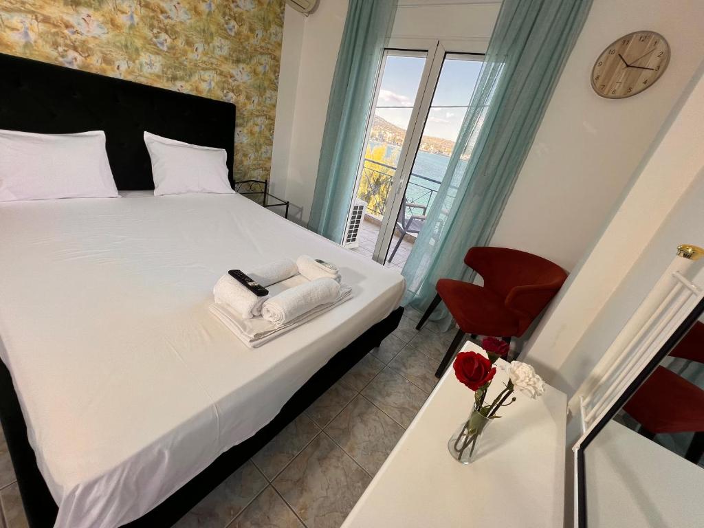 Postel nebo postele na pokoji v ubytování blue Hotel