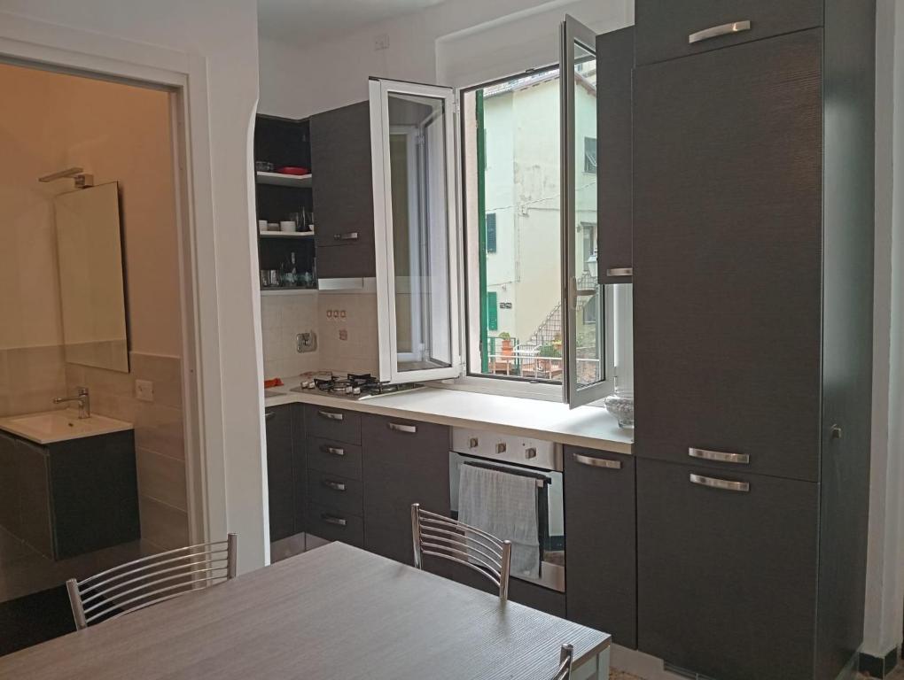 Kuchyň nebo kuchyňský kout v ubytování Casa Luigi