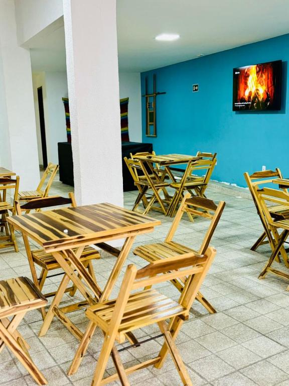 TV a/nebo společenská místnost v ubytování Hostel Recanto da Paciência