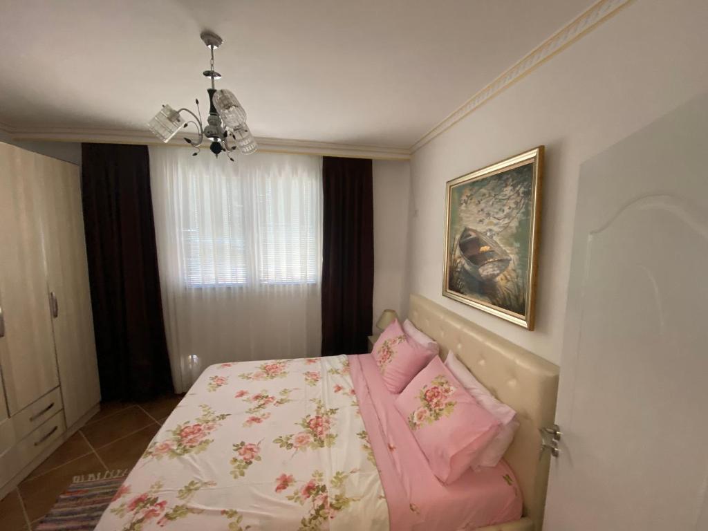 Ліжко або ліжка в номері Albi Apartmet beachfront in Shengjin