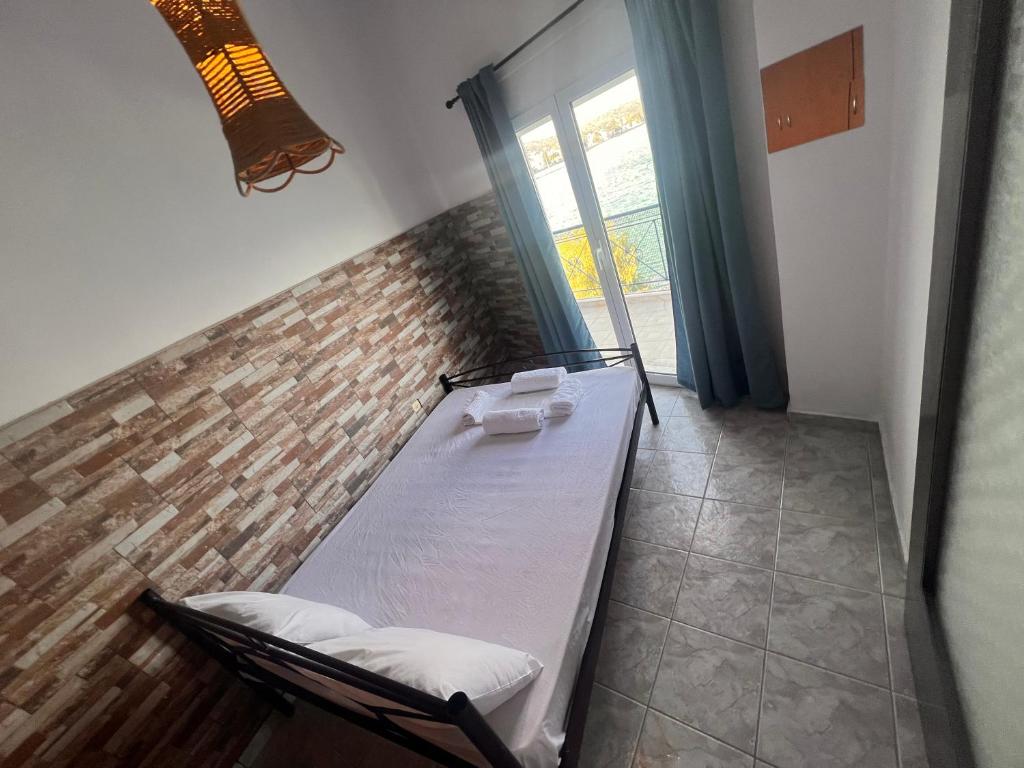 Postel nebo postele na pokoji v ubytování blue Hotel