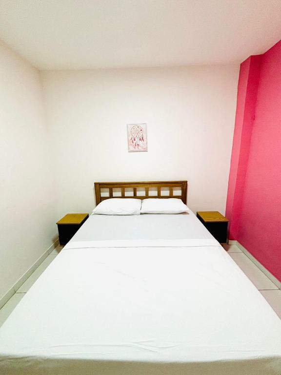 Postel nebo postele na pokoji v ubytování Hostel Recanto da Paciência