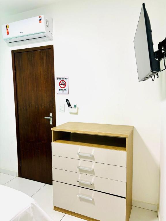 TV a/nebo společenská místnost v ubytování Hostel Recanto da Paciência