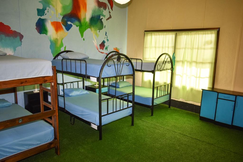 Postel nebo postele na pokoji v ubytování La Casona de Lobitos - Cowork