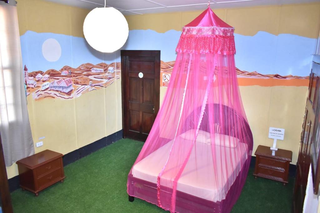 Postel nebo postele na pokoji v ubytování La Casona de Lobitos - Cowork