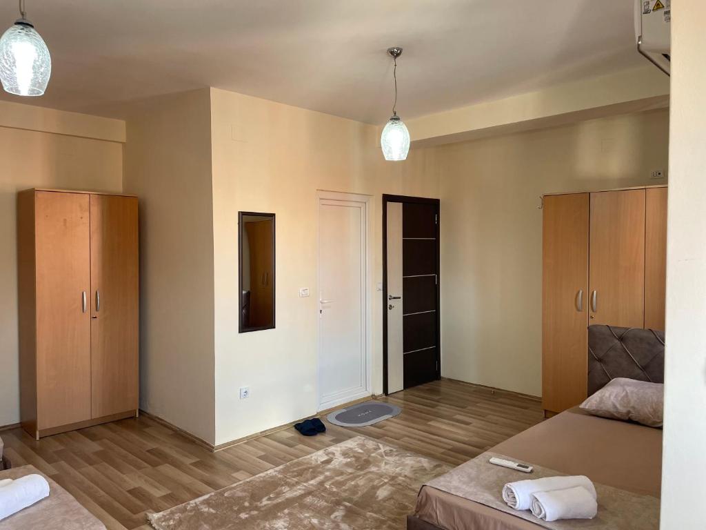 Postel nebo postele na pokoji v ubytování Hotel Balkan