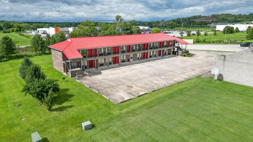 an aerial view of a building with a red roof at Country Nights Inn in West Union