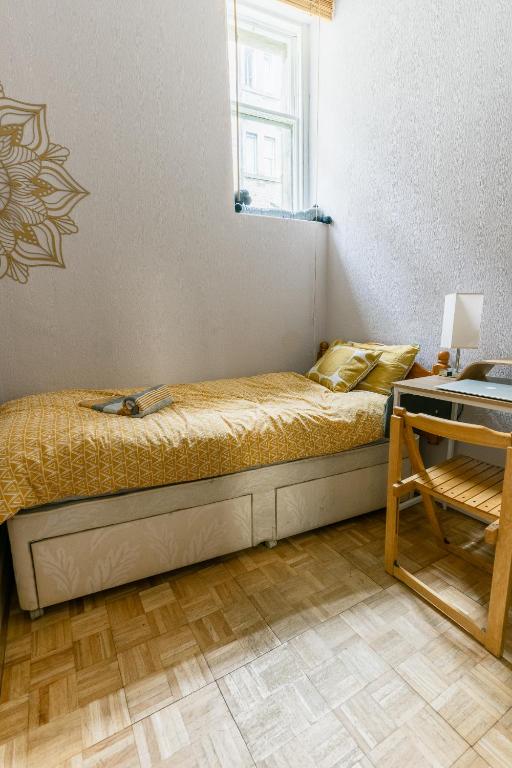 Postel nebo postele na pokoji v ubytování The Lotus Room