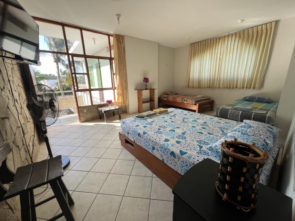 Postel nebo postele na pokoji v ubytování Stone House Mancora