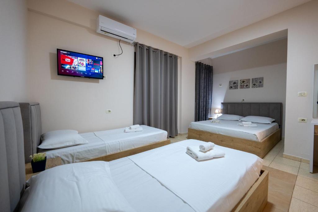 Letto o letti in una camera di Twins Hotel