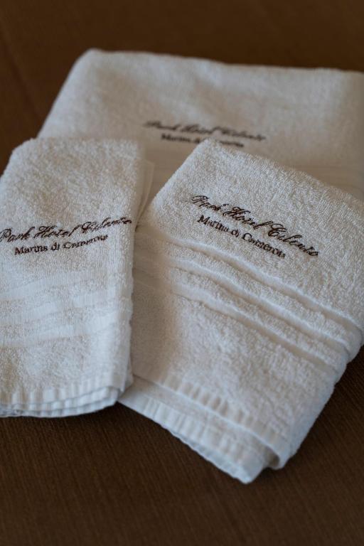 a close up of two napkins with writing on them at Park Hotel Cilento in Marina di Camerota