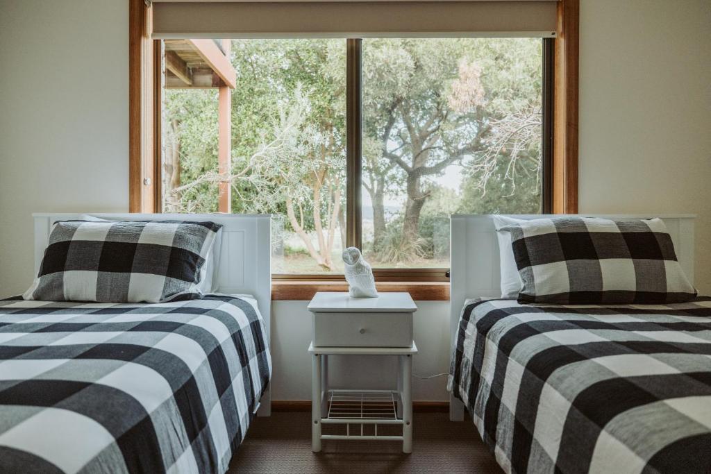Postel nebo postele na pokoji v ubytování Riverview Retreat