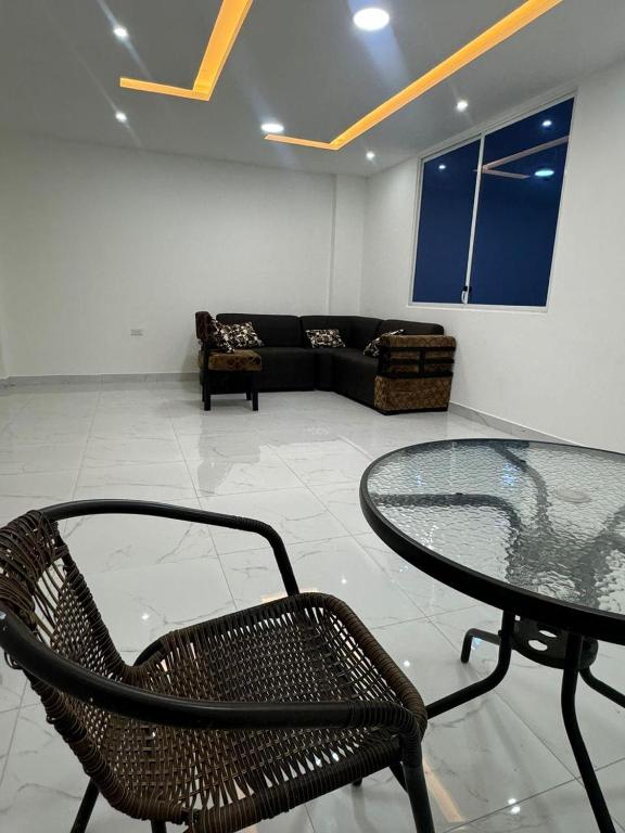 Posezení v ubytování Hostal Las Orquideas 2