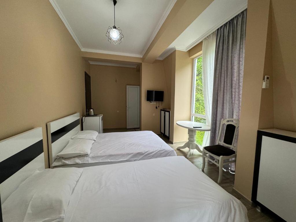 Postel nebo postele na pokoji v ubytování Royal House