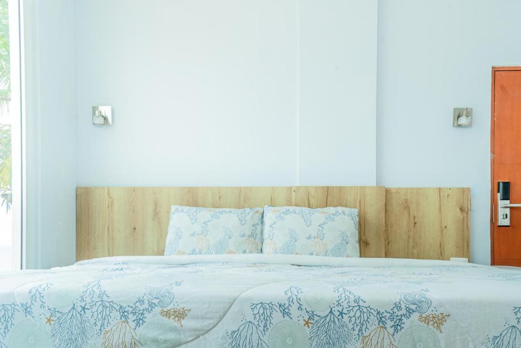 Postel nebo postele na pokoji v ubytování Hotel Caribbean Cartagena