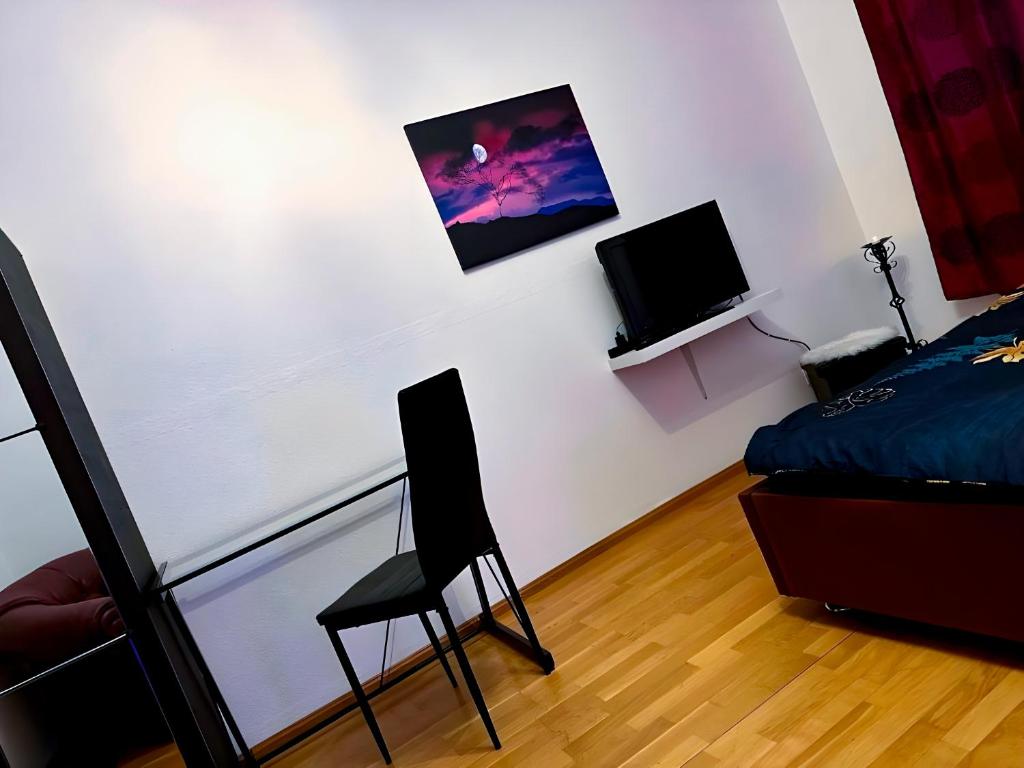 TV a/nebo společenská místnost v ubytování Self-Check-In Central Hostel BESTPRICE