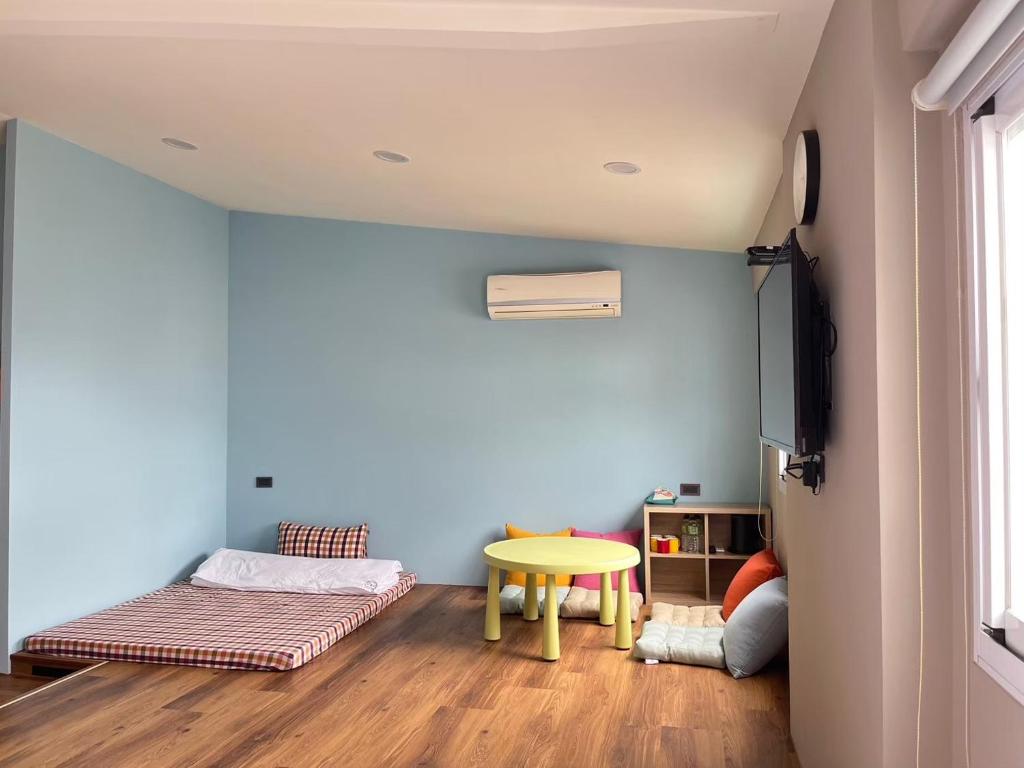 Postel nebo postele na pokoji v ubytování Xin Yuan Hang Homestay