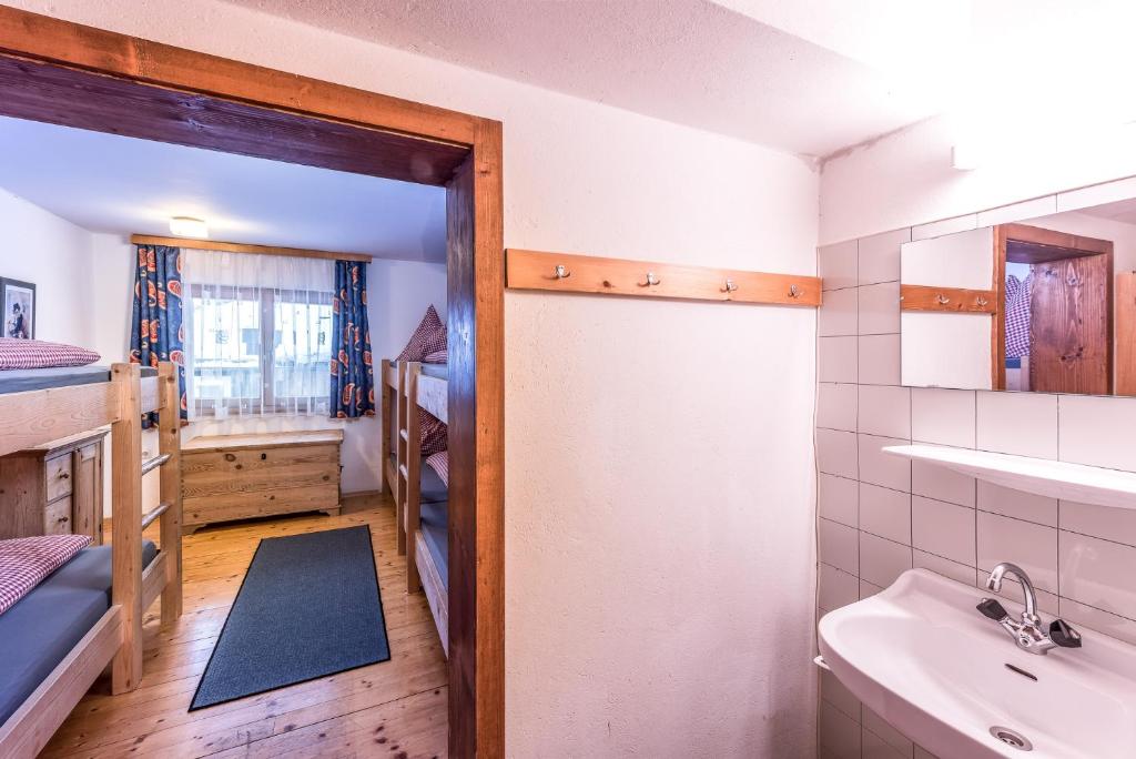 Voodi või voodid majutusasutuse Berggasthof Biberg toas