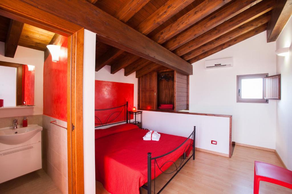 Кровать или кровати в номере B&B Perla del Sud