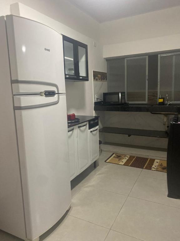 Kuchyň nebo kuchyňský kout v ubytování LM Home 2 - Casa com 3 Quartos