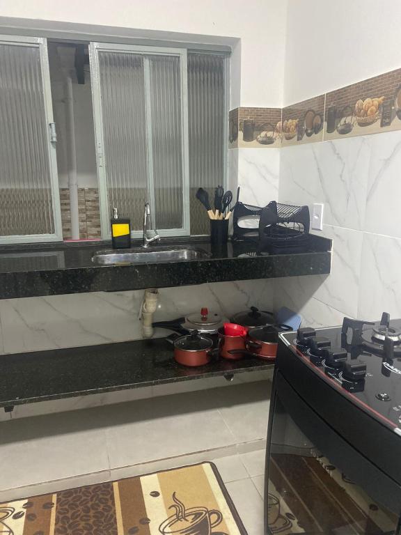 Kuchyň nebo kuchyňský kout v ubytování LM Home 2 - Casa com 3 Quartos