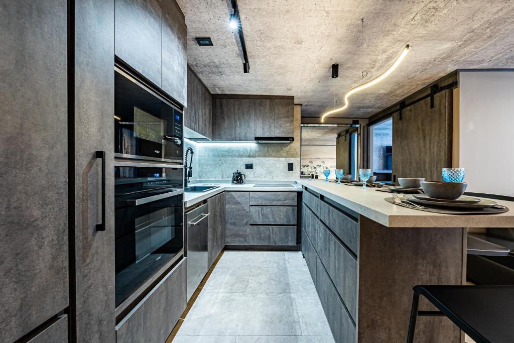 Kuchyň nebo kuchyňský kout v ubytování Design Tech Comfort & Location