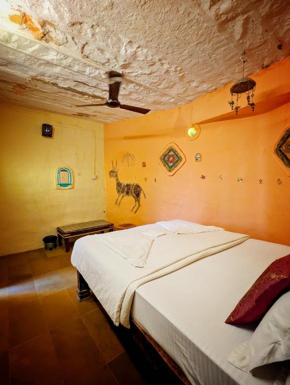 Postel nebo postele na pokoji v ubytování Saffron Guest House