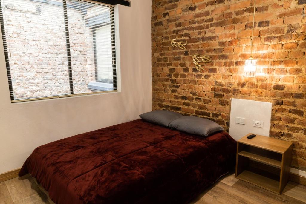 Postel nebo postele na pokoji v ubytování Las Aguas Inn