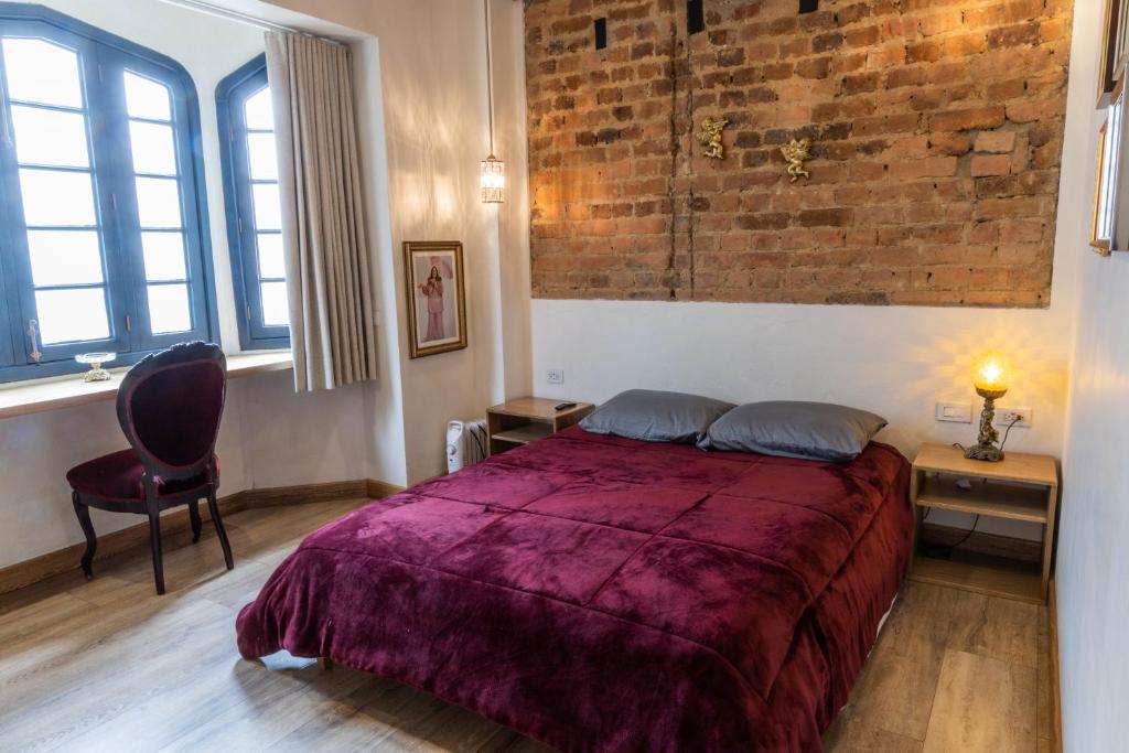 Postel nebo postele na pokoji v ubytování Las Aguas Inn