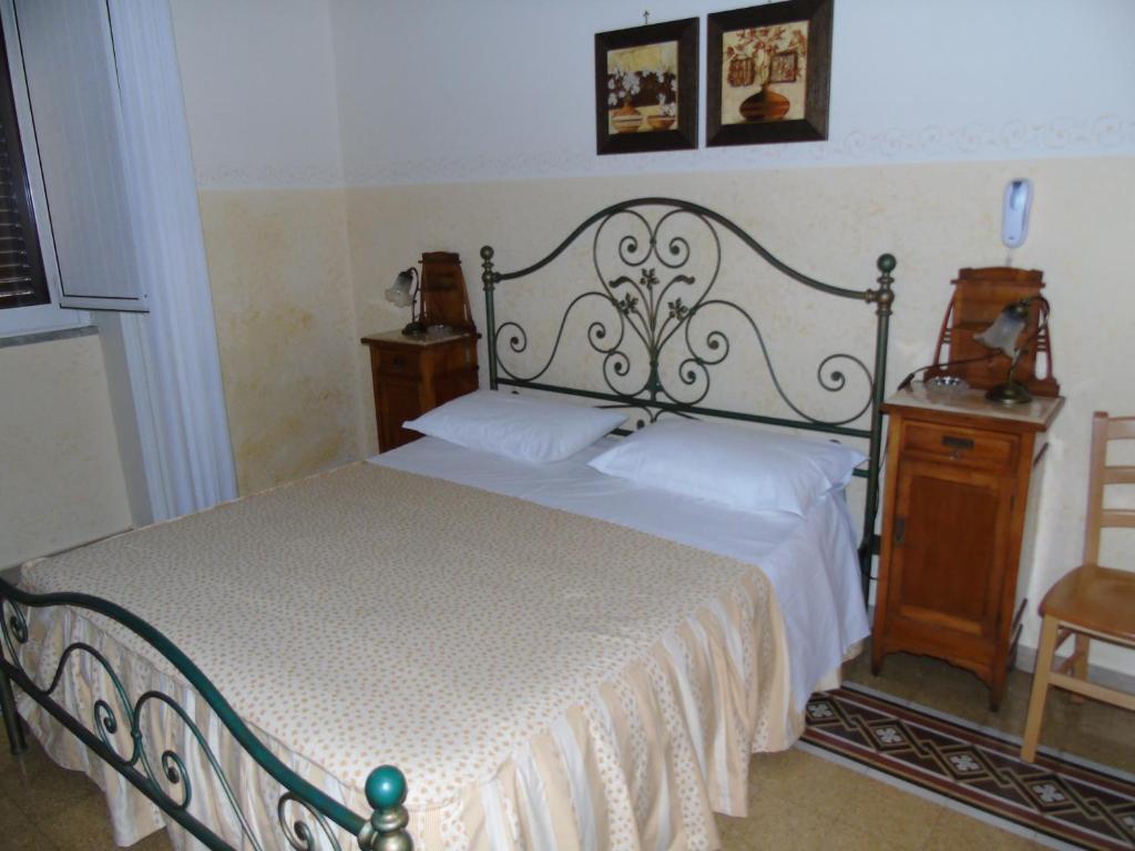 Postel nebo postele na pokoji v ubytování Albergo Cavour