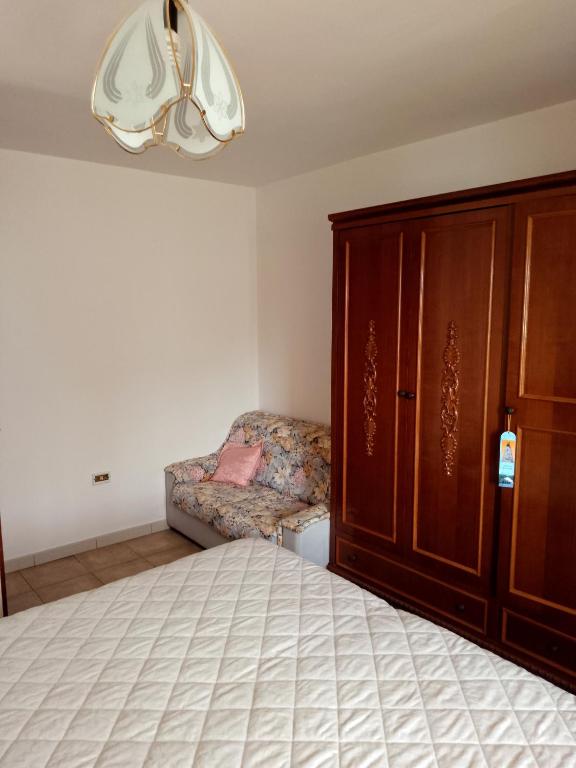 Postel nebo postele na pokoji v ubytování La Casa dei Nonni