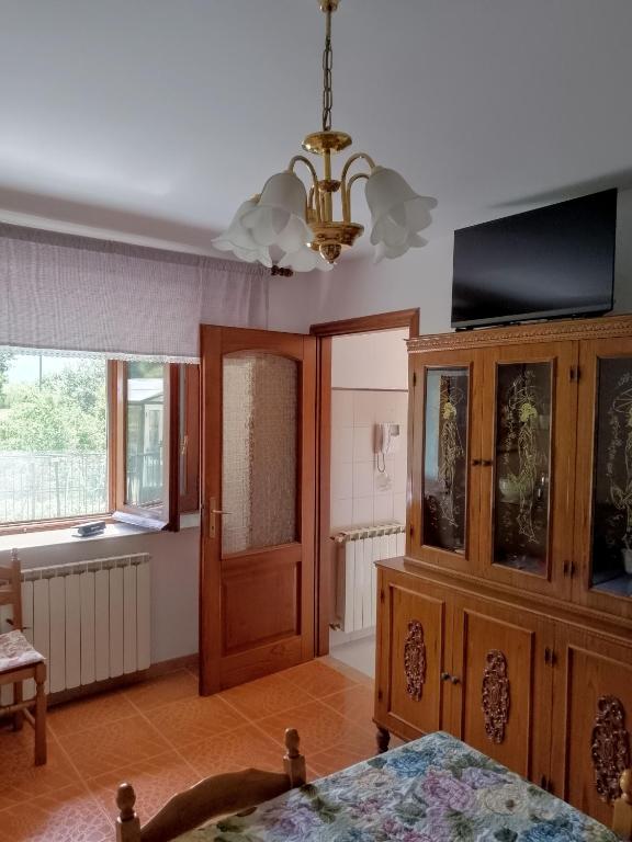 TV a/nebo společenská místnost v ubytování La Casa dei Nonni