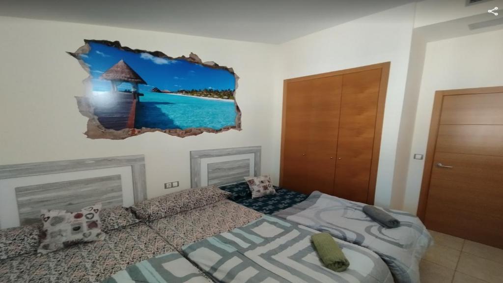 Posteľ alebo postele v izbe v ubytovaní Espectacular Chalet Adosado de lujo "Bienvenido al Paraíso"