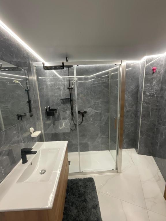 a bathroom with a shower and a sink at Gandia Borjia in Gandía