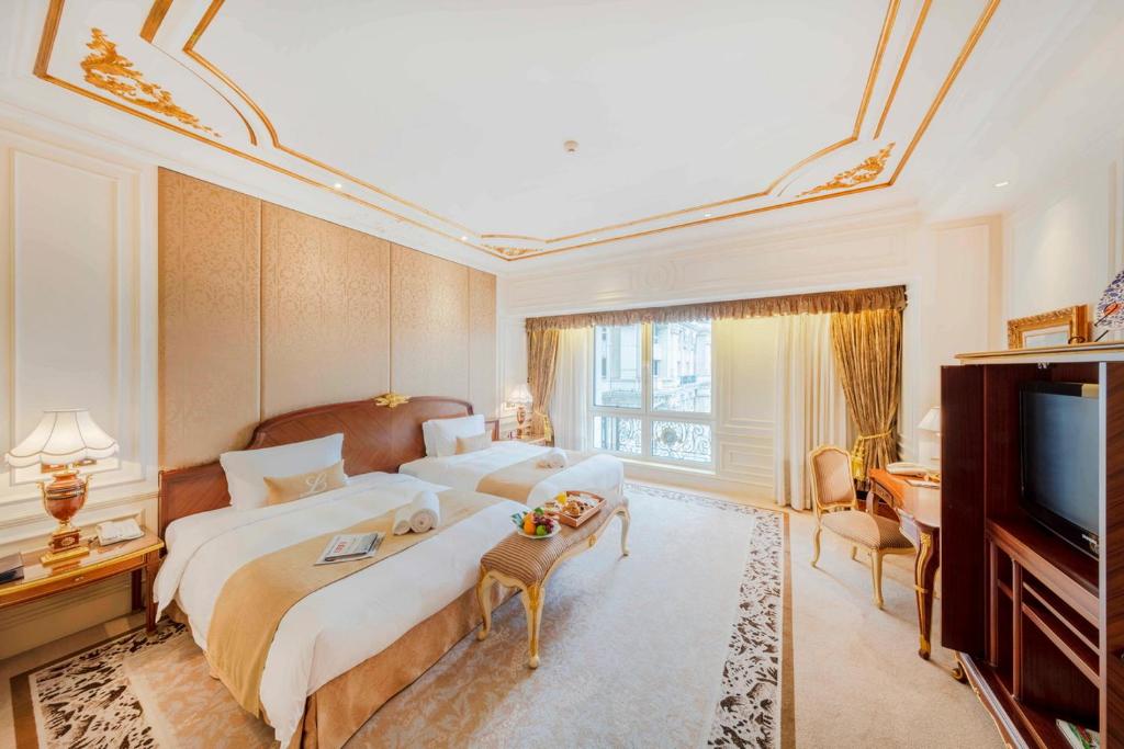 Postel nebo postele na pokoji v ubytování Legendale Hotel Beijing