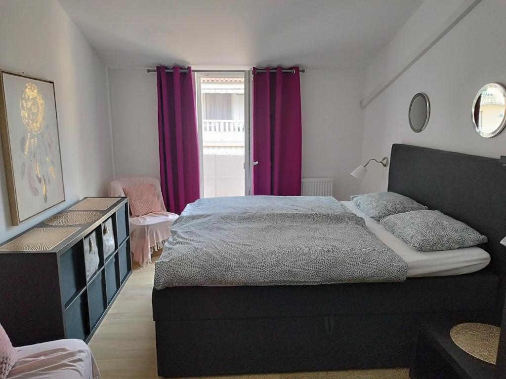 Posteľ alebo postele v izbe v ubytovaní Ferienwohnung am Sandstrand