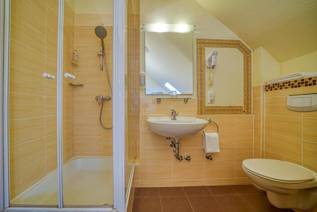 Koupelna v ubytování Hotel Wissers Fehmarn