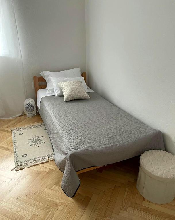 Postel nebo postele na pokoji v ubytování Apartman Noel Knin