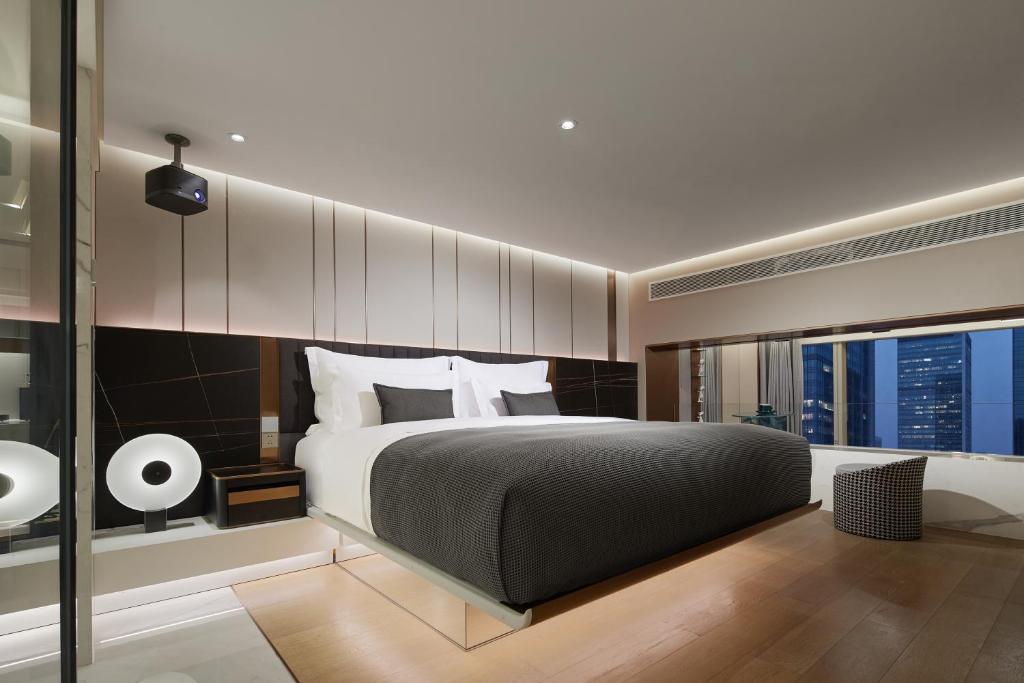 ISEYA Serviced Apart-ment Chengdu Taikoo Li Flagshipにあるベッド