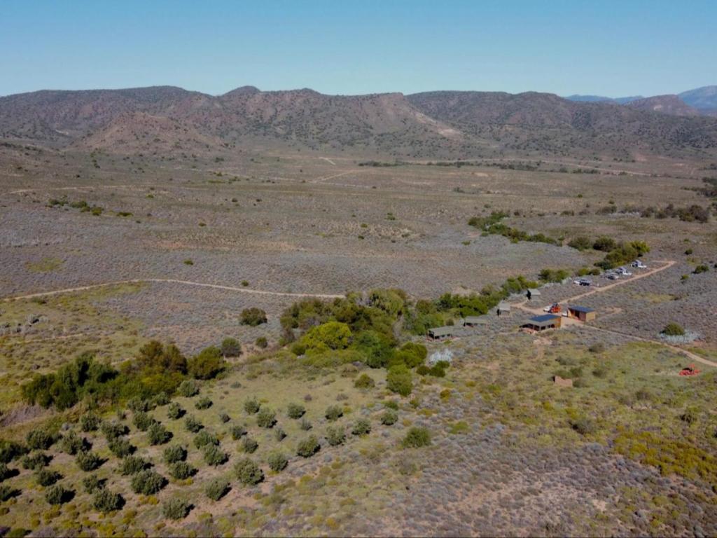 an aerial view of a river in the middle of a field at Ouberg Private Nature Reserve in Montagu