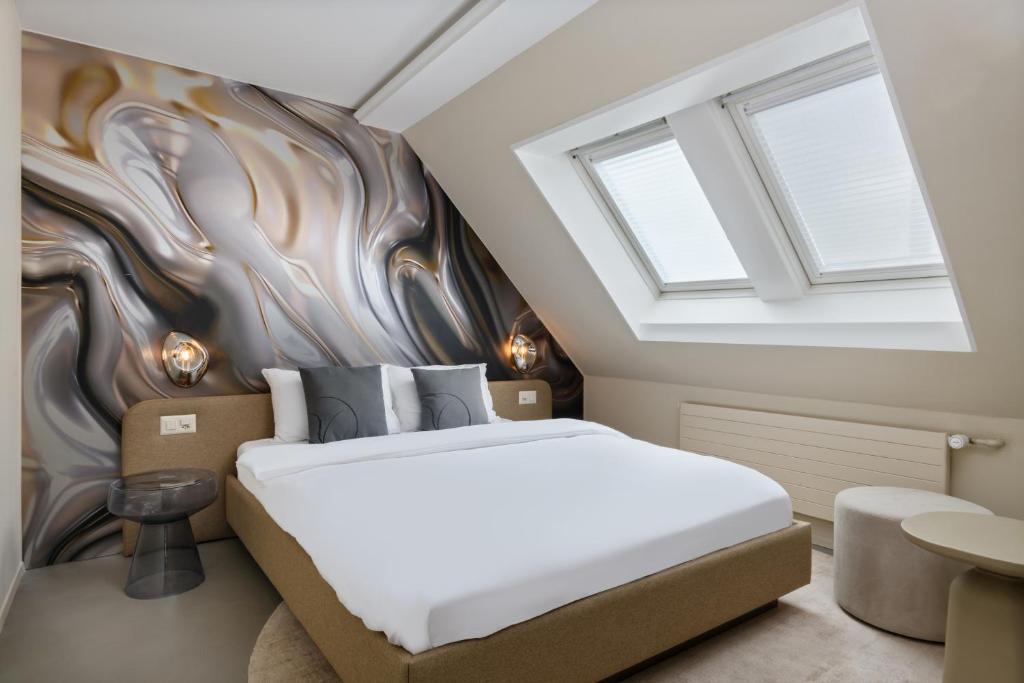 Katil atau katil-katil dalam bilik di VISIONAPARTMENTS Brandschenkestrasse - contactless check-in