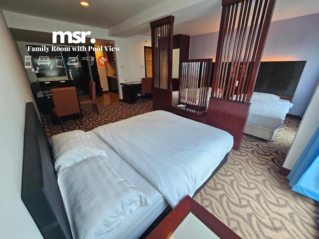 Postel nebo postele na pokoji v ubytování Kota Kinabalu City Ensuite at SCSP Ming Garden