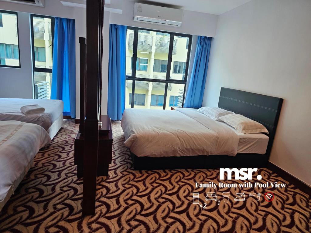 Postel nebo postele na pokoji v ubytování Kota Kinabalu City Ensuite at SCSP Ming Garden