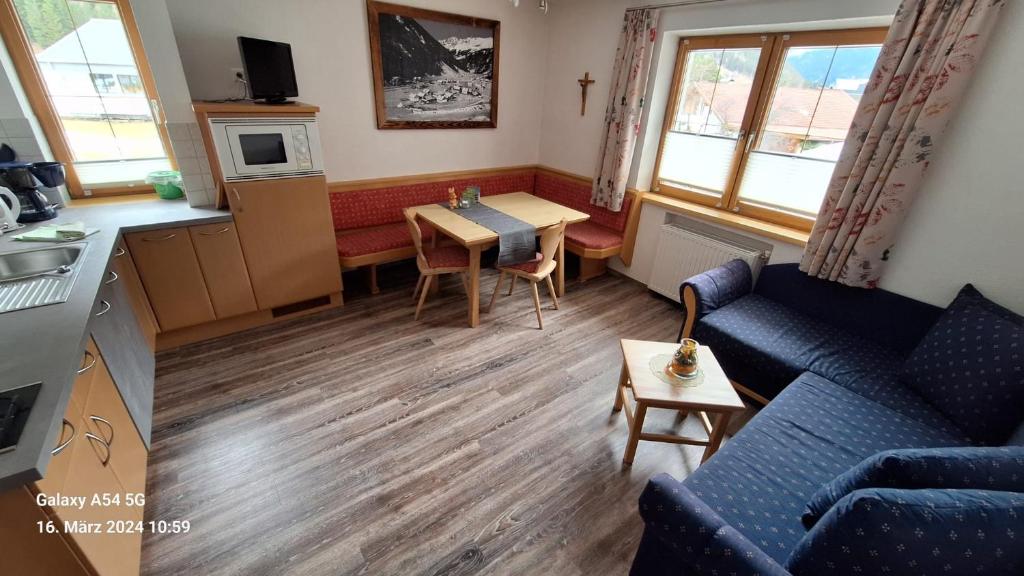 Kuchyň nebo kuchyňský kout v ubytování Haus Alpina